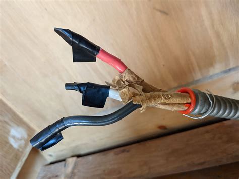 wiring armoured cable to wall